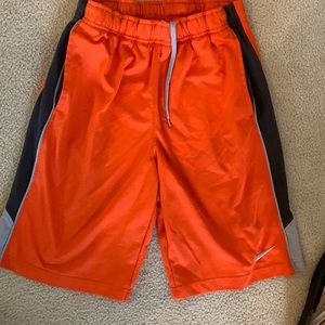 Nike youth orange shorts